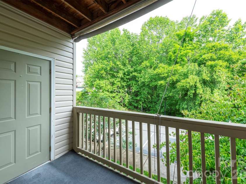 509 Carrington Place, Arden, NC 28704.  MLS# CAR4384818, YatesRealty ID 33123. Balcony Deck