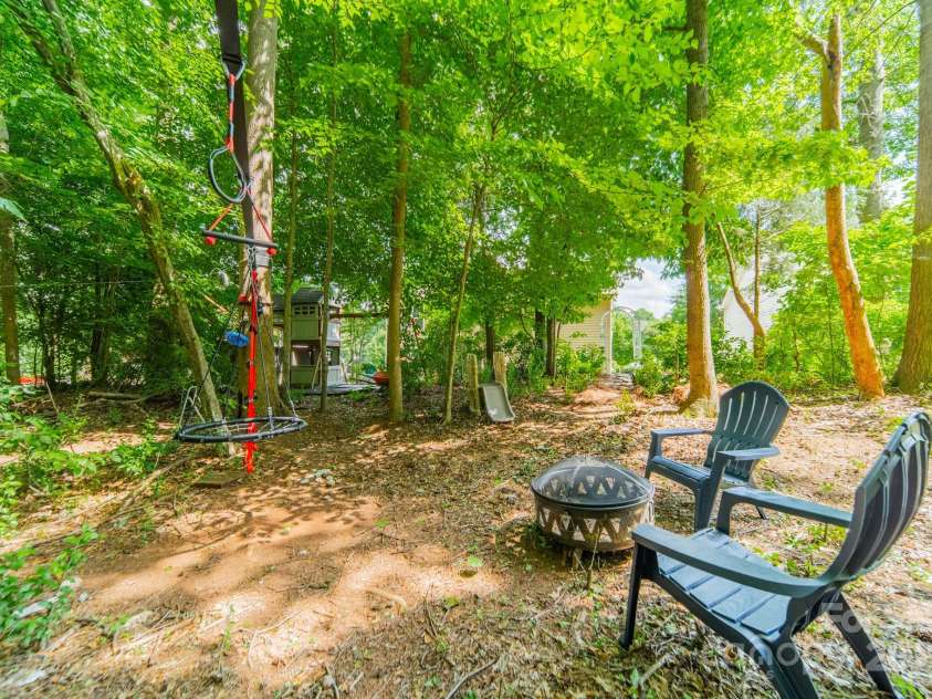 5804 Dinsmore Lane, Belmont, NC 28012.  MLS# CAR4264169, YatesRealty ID 33124. Fire pit area