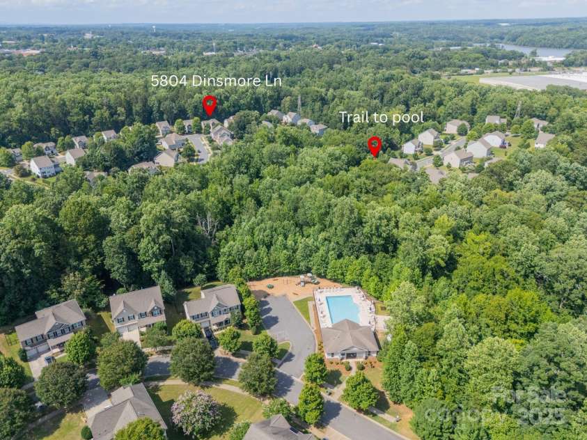 5804 Dinsmore Lane, Belmont, NC 28012.  MLS# CAR4264169, YatesRealty ID 33124. Neighborhood trail leading to the community pool
