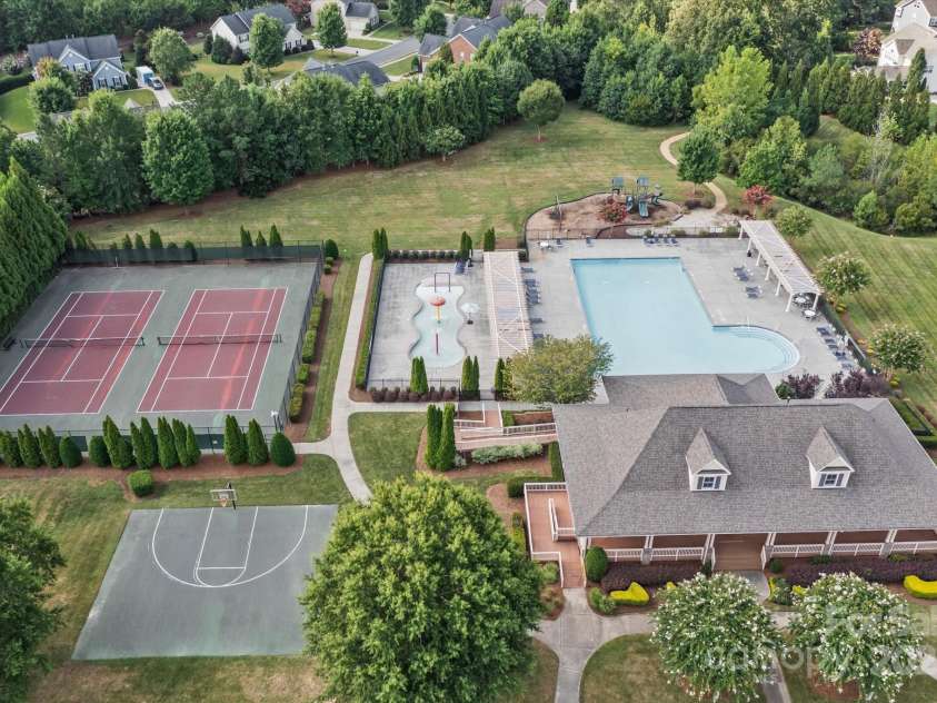 1040 Lake Forest Drive, Matthews, NC 28104.  MLS# CAR4285953, YatesRealty ID 33125. Aerial View of Clubhouse Sprayground