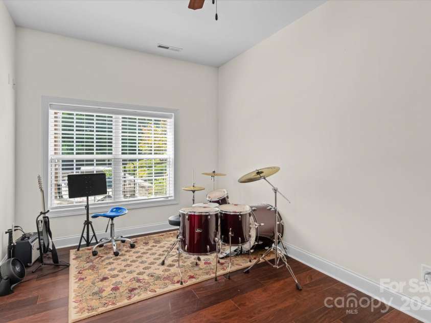 1040 Lake Forest Drive, Matthews, NC 28104.  MLS# CAR4285953, YatesRealty ID 33125. Basement Level Bedroom used as Bonus Area