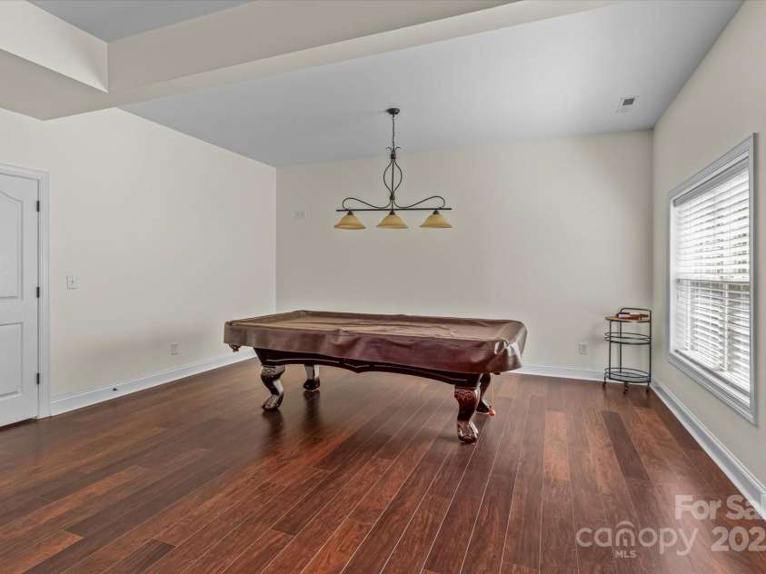 1040 Lake Forest Drive, Matthews, NC 28104.  MLS# CAR4285953, YatesRealty ID 33125. Billiards Table Conveys