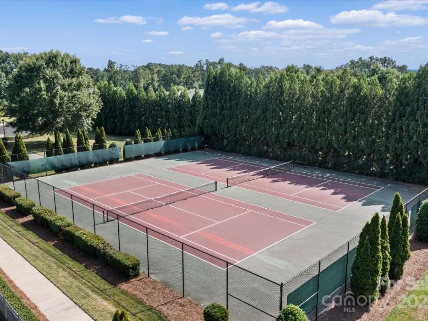 1040 Lake Forest Drive, Matthews, NC 28104.  MLS# CAR4285953, YatesRealty ID 33125. Clubhouse Tennis court