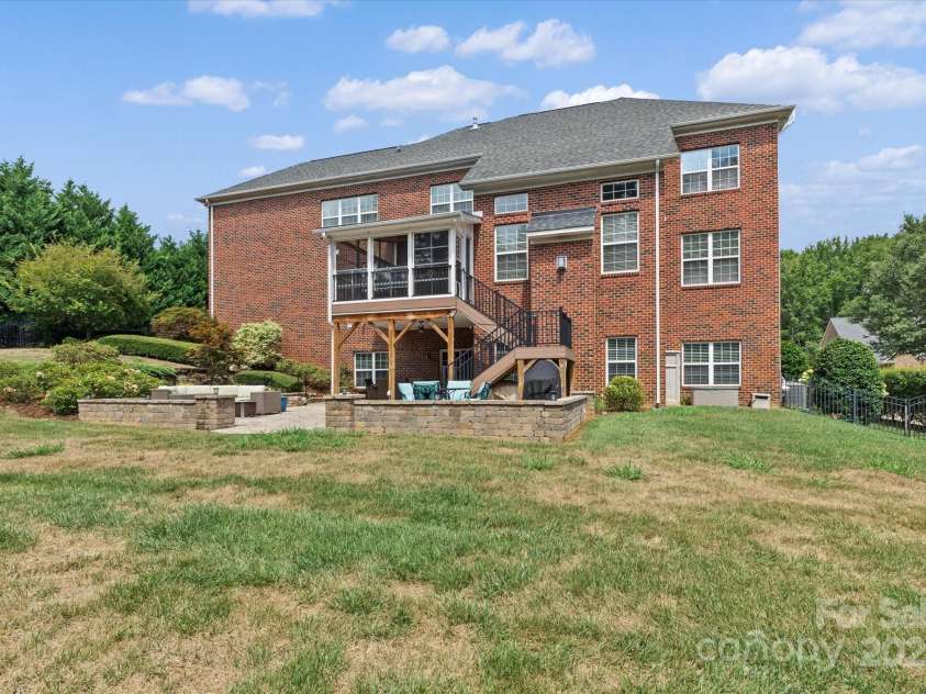 1040 Lake Forest Drive, Matthews, NC 28104.  MLS# CAR4285953, YatesRealty ID 33125. Exterior Rear