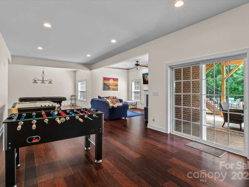 1040 Lake Forest Drive, Matthews, NC 28104.  MLS# CAR4285953, YatesRealty ID 33125. Game Room Area in Basement