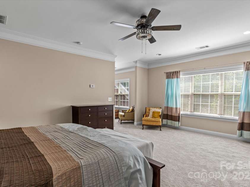 1040 Lake Forest Drive, Matthews, NC 28104.  MLS# CAR4285953, YatesRealty ID 33125. Primary Bedroom with a ton of Natural light