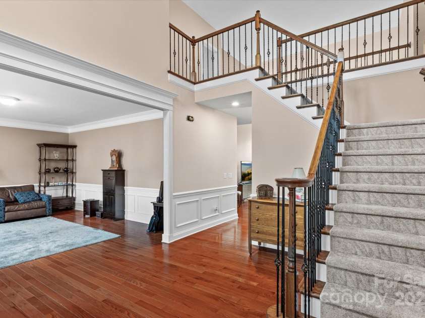 1040 Lake Forest Drive, Matthews, NC 28104.  MLS# CAR4285953, YatesRealty ID 33125. Stairs to 2nd floor