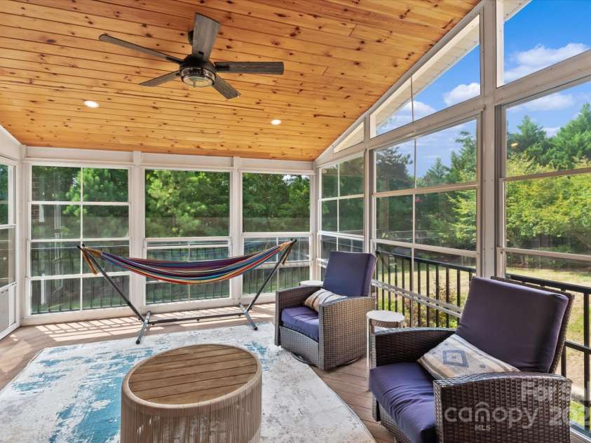 1040 Lake Forest Drive, Matthews, NC 28104.  MLS# CAR4285953, YatesRealty ID 33125. Sunroom with Eze-Breeze Window Screens