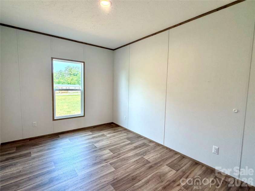 146 Con Lee Drive, Olin, NC 28660.  MLS# CAR4397827, YatesRealty ID 33129. BEDROOM