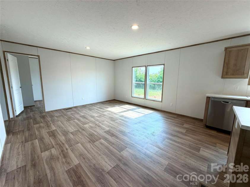 146 Con Lee Drive, Olin, NC 28660.  MLS# CAR4397827, YatesRealty ID 33129. FAMILY ROOM