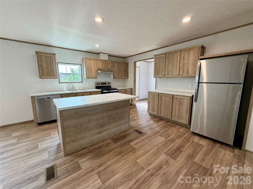 146 Con Lee Drive, Olin, NC 28660.  MLS# CAR4397827, YatesRealty ID 33129. KITCHEN