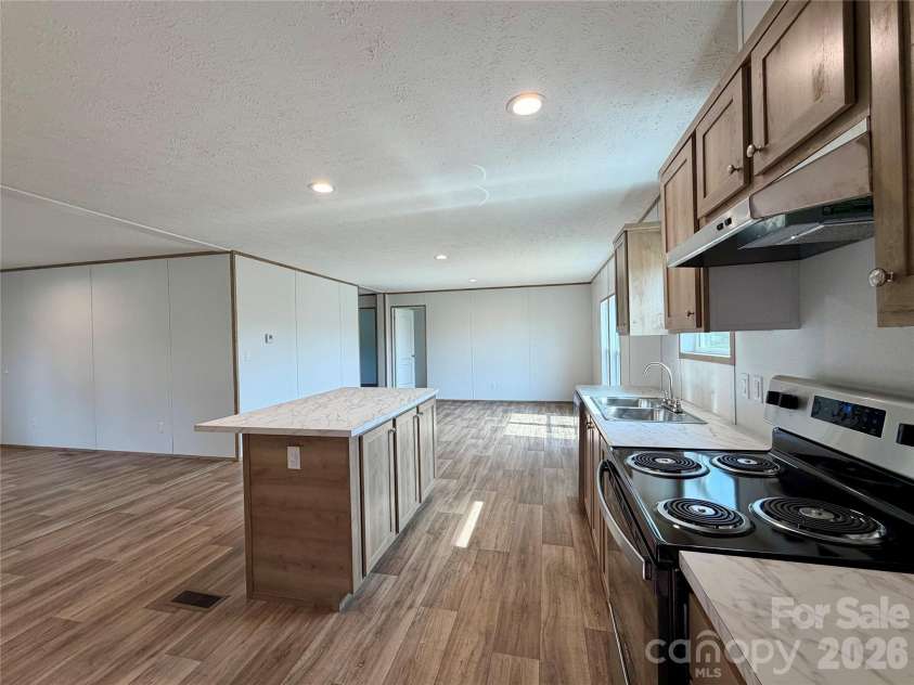 146 Con Lee Drive, Olin, NC 28660.  MLS# CAR4397827, YatesRealty ID 33129. KITCHEN