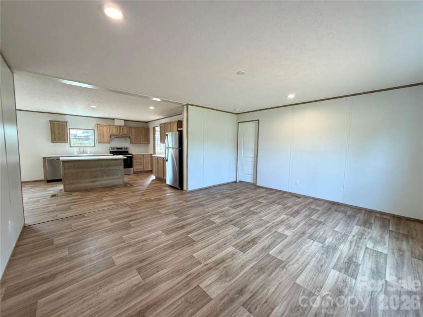 146 Con Lee Drive, Olin, NC 28660.  MLS# CAR4397827, YatesRealty ID 33129. LIVING ROOM