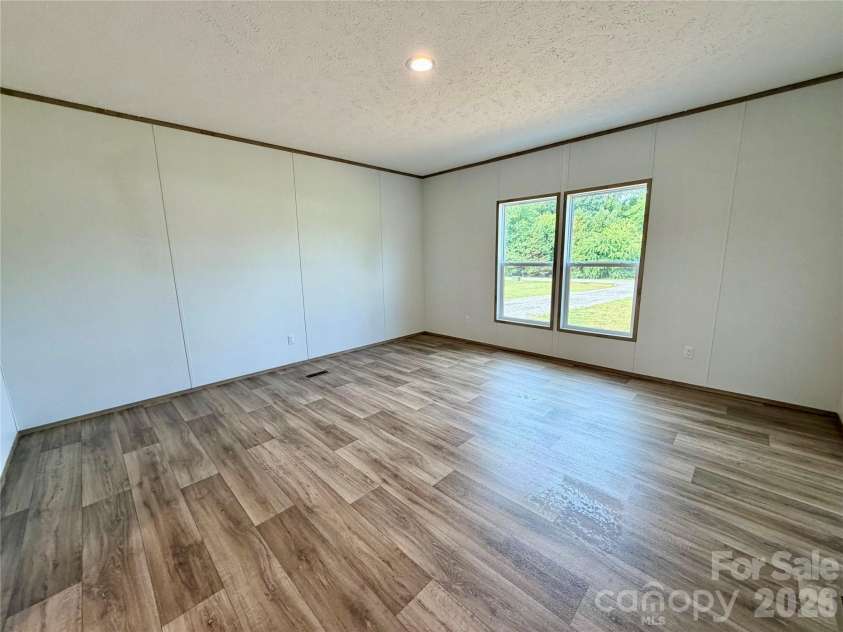 146 Con Lee Drive, Olin, NC 28660.  MLS# CAR4397827, YatesRealty ID 33129. PRIMARY BEDROOM
