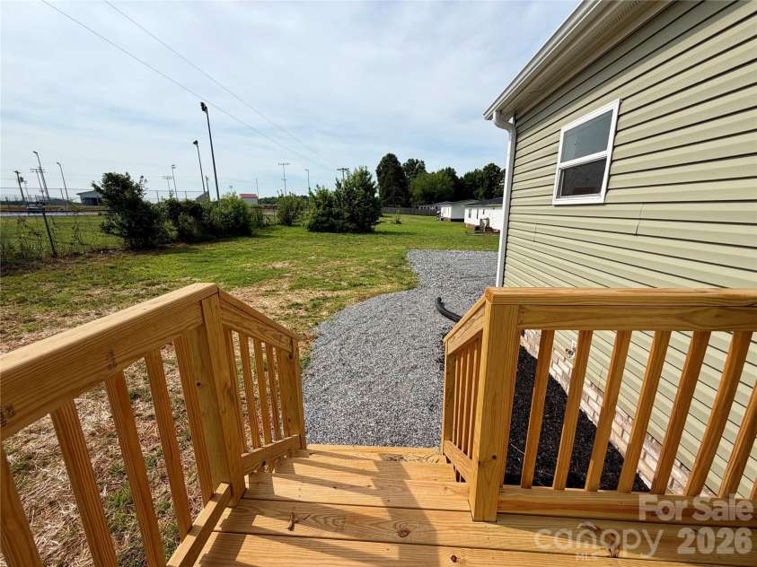 146 Con Lee Drive, Olin, NC 28660.  MLS# CAR4397827, YatesRealty ID 33129. REAR DECK