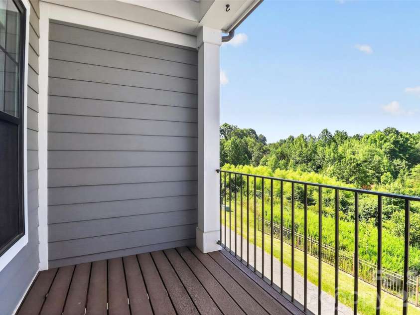 115 Mint Avenue, Mooresville, NC 28117.  MLS# CAR4397939, YatesRealty ID 33130. Primary Suite Balcony