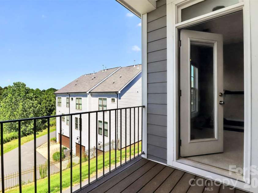 115 Mint Avenue, Mooresville, NC 28117.  MLS# CAR4397939, YatesRealty ID 33130. Primary Suite Balcony