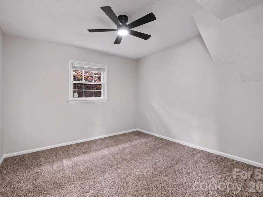 1030 Mclaughlin Drive, Charlotte, NC 28212.  MLS# CAR4393613, YatesRealty ID 33132. Lower Bedroom