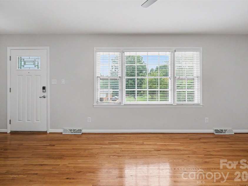 1030 Mclaughlin Drive, Charlotte, NC 28212.  MLS# CAR4393613, YatesRealty ID 33132. Main Level Living Room