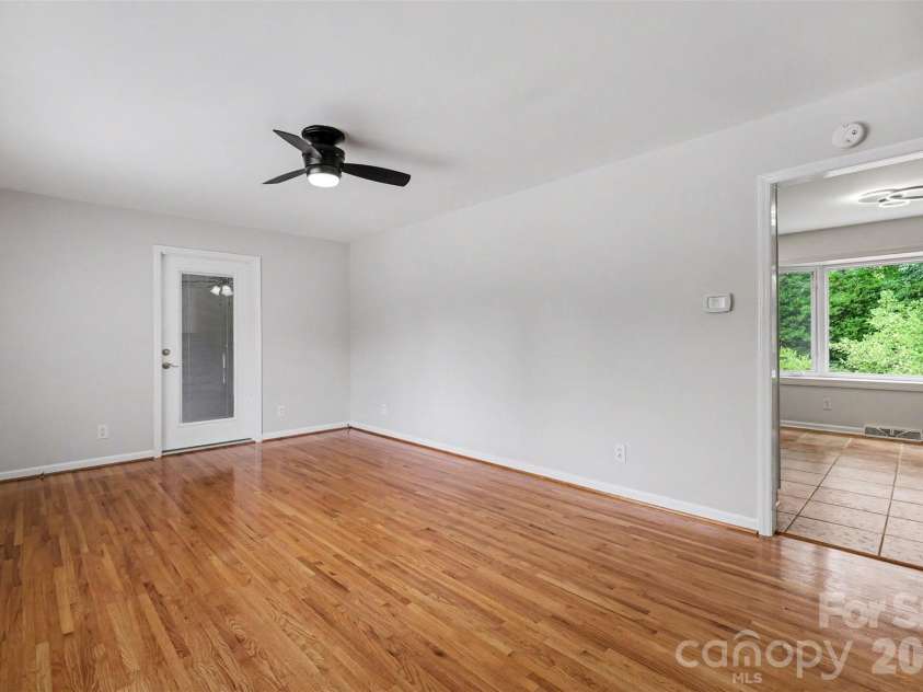 1030 Mclaughlin Drive, Charlotte, NC 28212.  MLS# CAR4393613, YatesRealty ID 33132. Main Level Living Room