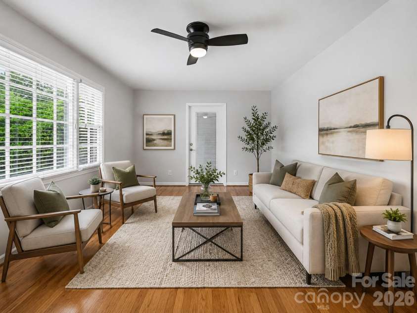 1030 Mclaughlin Drive, Charlotte, NC 28212.  MLS# CAR4393613, YatesRealty ID 33132. Virtually staged main family room