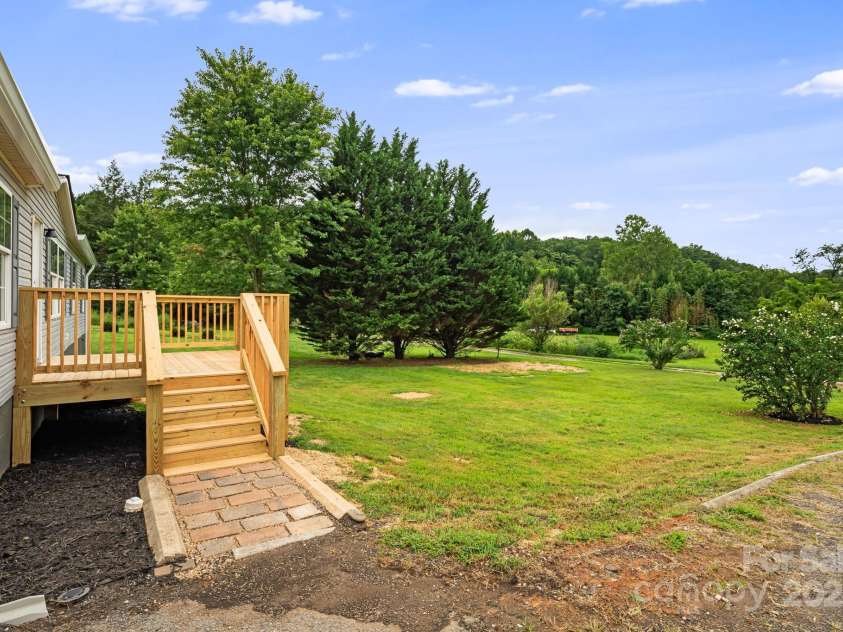 21 Toms Road, Candler, NC 28715.  MLS# CAR4289233, YatesRealty ID 33132. 