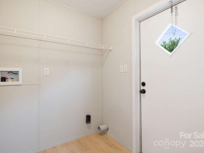 21 Toms Road, Candler, NC 28715.  MLS# CAR4289233, YatesRealty ID 33132. 