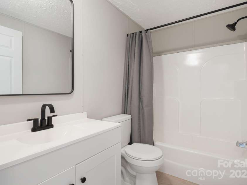 21 Toms Road, Candler, NC 28715.  MLS# CAR4289233, YatesRealty ID 33132. 