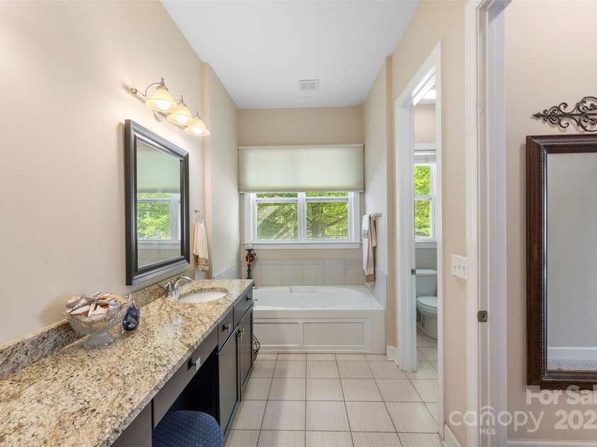 1204 Vaugelas Court, Monroe, NC 28110.  MLS# CAR4280337, YatesRealty ID 33134. A private retreat on the main level—convenient and serene.