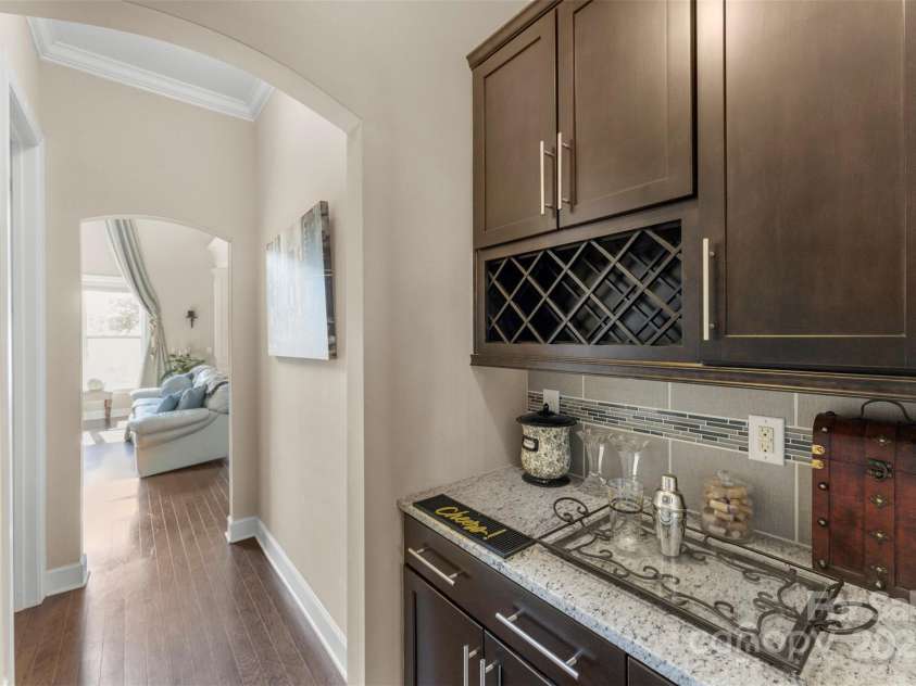 1204 Vaugelas Court, Monroe, NC 28110.  MLS# CAR4280337, YatesRealty ID 33134. An entertainer’s delight—dedicated bar space makes hosting effortless.