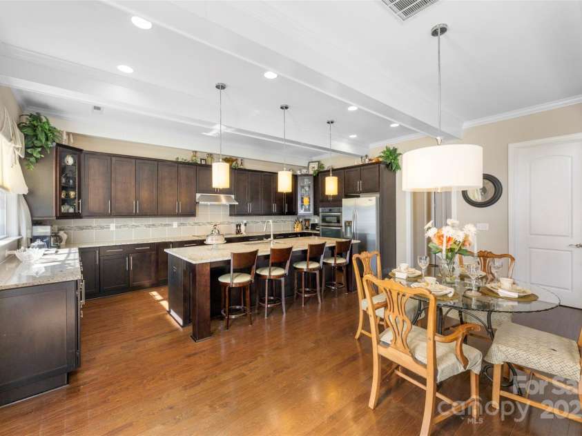 1204 Vaugelas Court, Monroe, NC 28110.  MLS# CAR4280337, YatesRealty ID 33134. Expansive counters and generous cabinetry create function and flow, with space to add your personal touches.