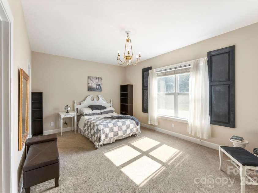 1204 Vaugelas Court, Monroe, NC 28110.  MLS# CAR4280337, YatesRealty ID 33134. Generously sized bedroom—ideal for extended stays or multi-use living with ensuite bathroom.
