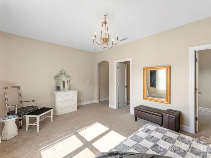 1204 Vaugelas Court, Monroe, NC 28110.  MLS# CAR4280337, YatesRealty ID 33134. Generously sized bedroom—ideal for extended stays or multi-use living with ensuite bathroom.