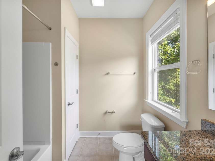 1204 Vaugelas Court, Monroe, NC 28110.  MLS# CAR4280337, YatesRealty ID 33134. Perfect for in-laws, teens, or long-term guests who want a space that feels like their own.
