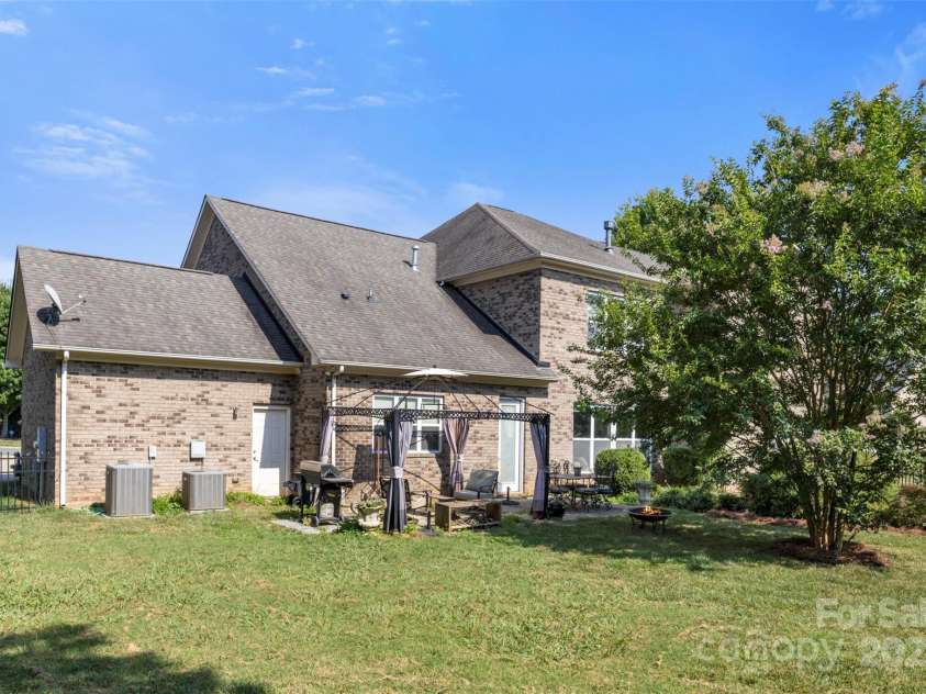 1204 Vaugelas Court, Monroe, NC 28110.  MLS# CAR4280337, YatesRealty ID 33134. Plenty of room to create the ultimate retreat—picture firepit gatherings, summer barbecues, or a play space that grows with your family.