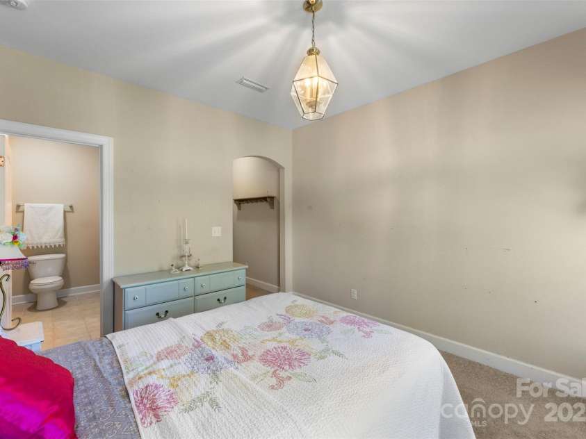 1204 Vaugelas Court, Monroe, NC 28110.  MLS# CAR4280337, YatesRealty ID 33134. Spacious secondary bedroom with room to grow and an ensuite bath