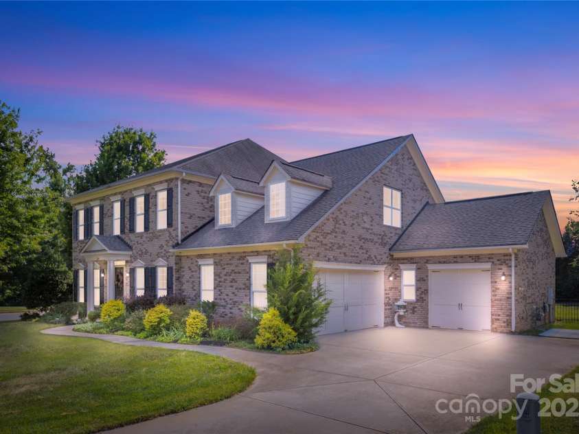 1204 Vaugelas Court, Monroe, NC 28110.  MLS# CAR4280337, YatesRealty ID 33134. Stately curb appeal right near the heart of Wesley Chapel—set on a quiet corner lot with room to spread out!