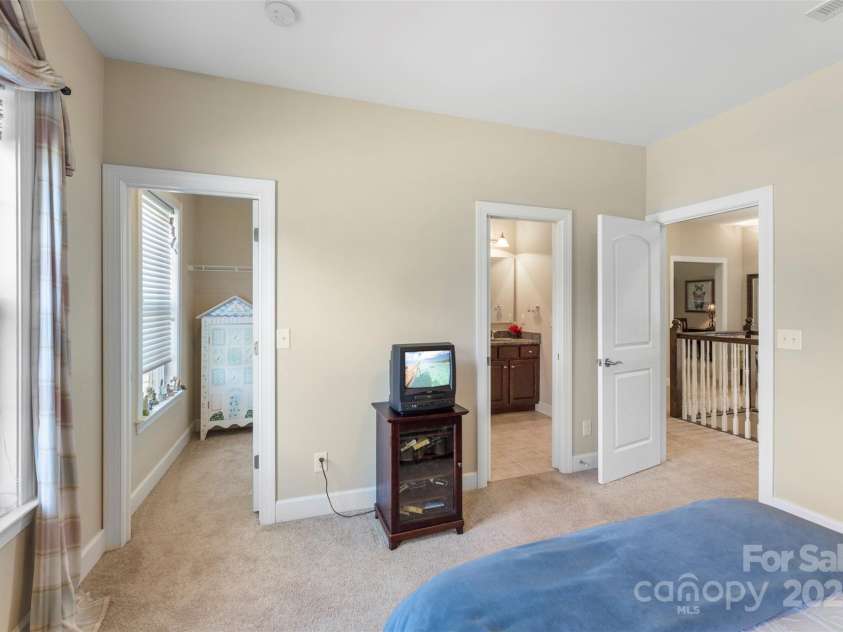 1204 Vaugelas Court, Monroe, NC 28110.  MLS# CAR4280337, YatesRealty ID 33134. Sunlit bedroom offers flexible use—guest retreat, nursery, or hobby room with the ensuite bath.