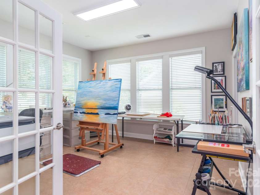 11728 Mount Argus Drive, Cornelius, NC 28031.  MLS# CAR4291411, YatesRealty ID 33139. Guest room, study, or art studio with walk in closet and french doors!