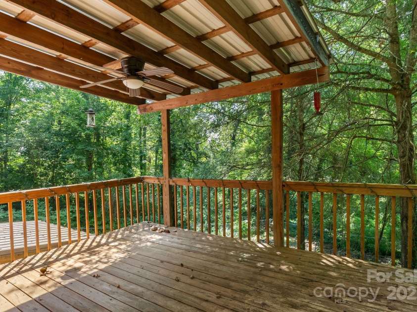186 Pisgah View Road, Asheville, NC 28806.  MLS# CAR4293363, YatesRealty ID 33142. Main level covered deck