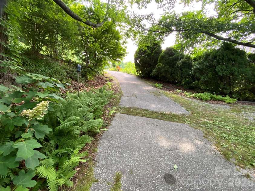 58 Seminary Street, Saluda, NC 28773.  MLS# CAR4398152, YatesRealty ID 33150. 