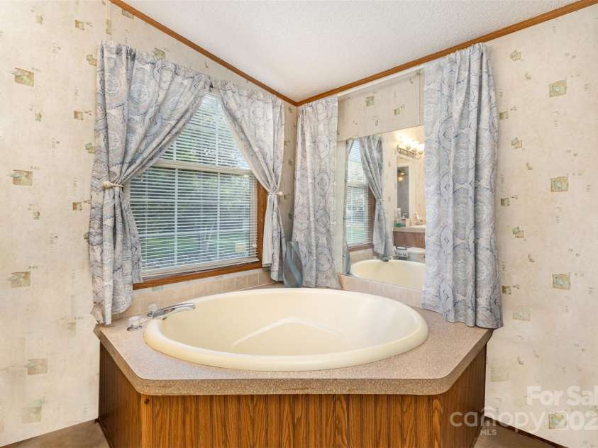 1140 Peppertree Drive, Mount Holly, NC 28120.  MLS# CAR4293992, YatesRealty ID 33154. 