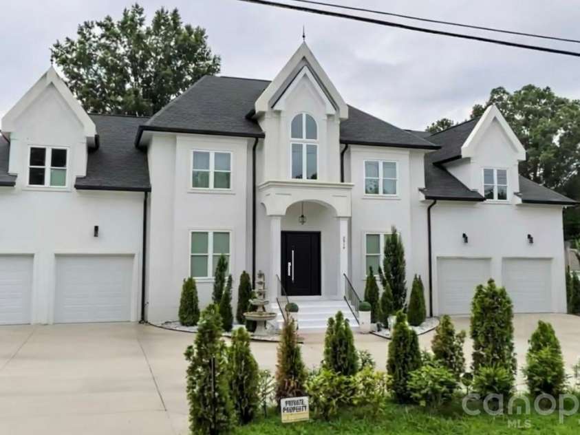 2916 Margaret Wallace Road, Matthews, NC 28105.  MLS# CAR4398220, YatesRealty ID 33157. Exterior front