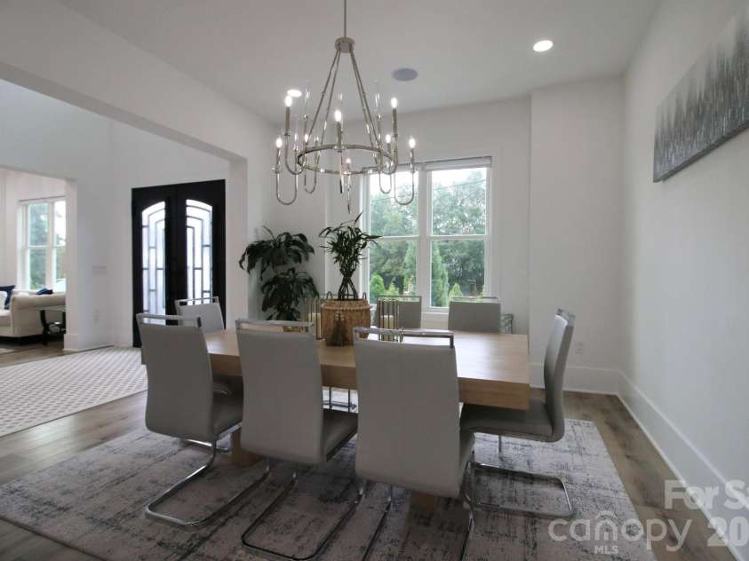 2916 Margaret Wallace Road, Matthews, NC 28105.  MLS# CAR4398220, YatesRealty ID 33157. Formal dining room