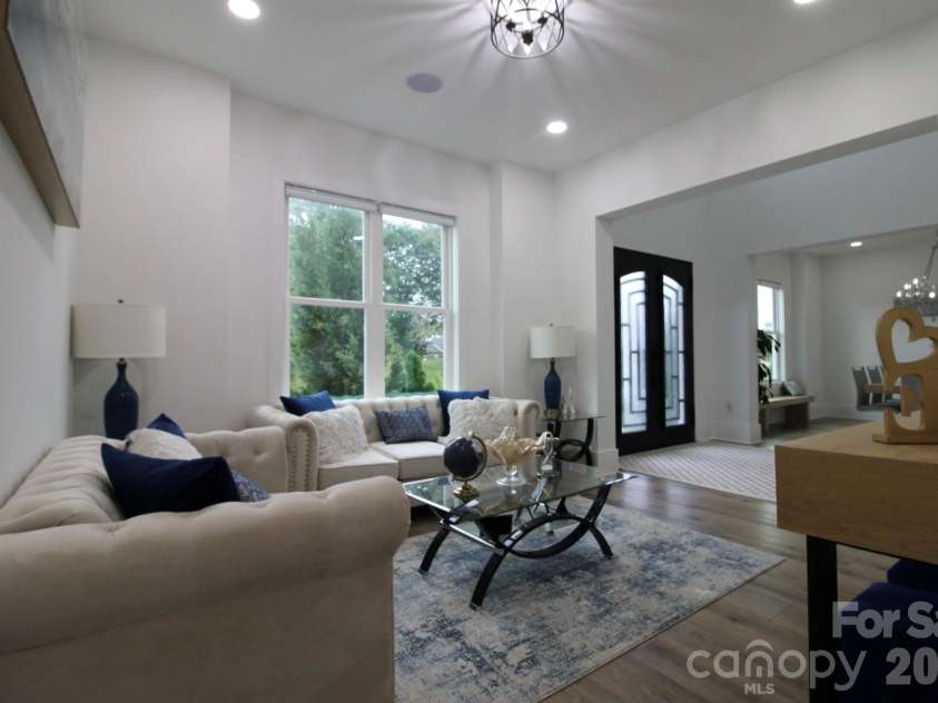2916 Margaret Wallace Road, Matthews, NC 28105.  MLS# CAR4398220, YatesRealty ID 33157. Formal sitting area
