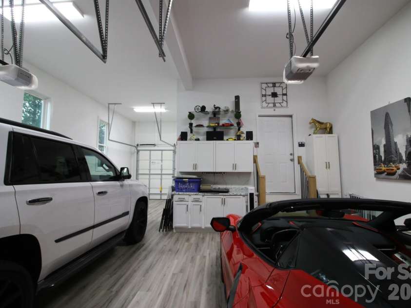 2916 Margaret Wallace Road, Matthews, NC 28105.  MLS# CAR4398220, YatesRealty ID 33157. Garage