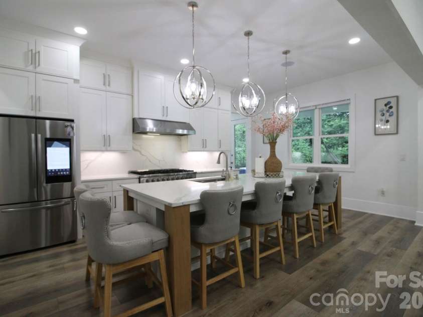 2916 Margaret Wallace Road, Matthews, NC 28105.  MLS# CAR4398220, YatesRealty ID 33157. Kitchen