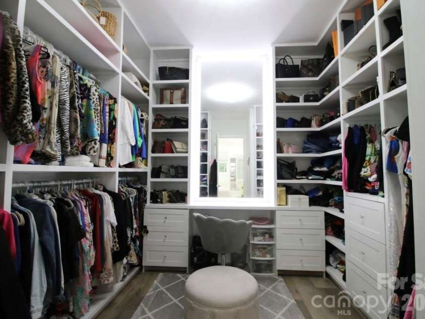 2916 Margaret Wallace Road, Matthews, NC 28105.  MLS# CAR4398220, YatesRealty ID 33157. Master closet