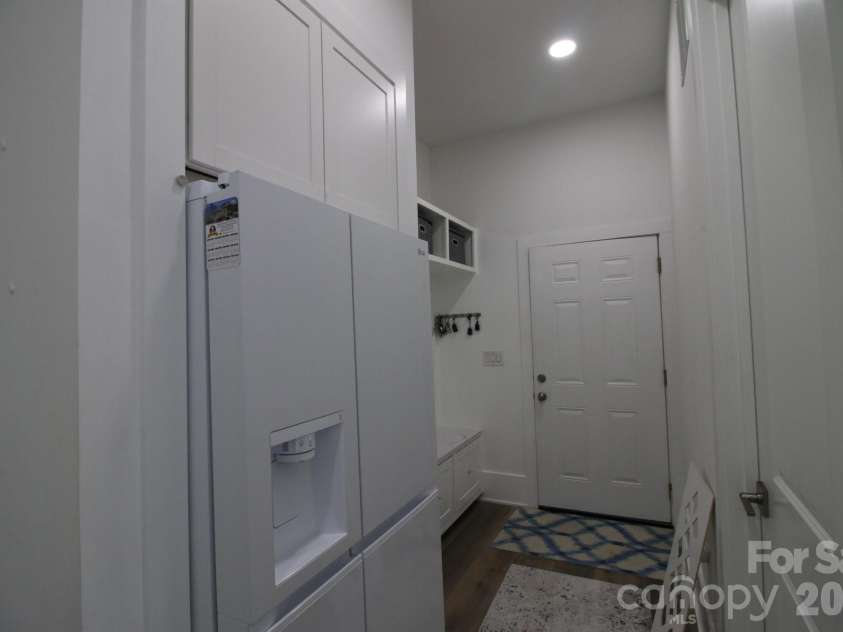 2916 Margaret Wallace Road, Matthews, NC 28105.  MLS# CAR4398220, YatesRealty ID 33157. Mudroom