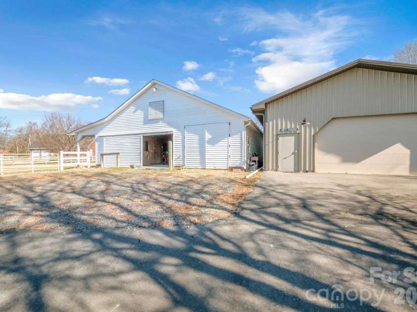 5432 Highway 218 Highway, Monroe, NC 28110.  MLS# CAR4340240, YatesRealty ID 3316. Detached garage has two sections one side (655 sq ft) is heated and cooled